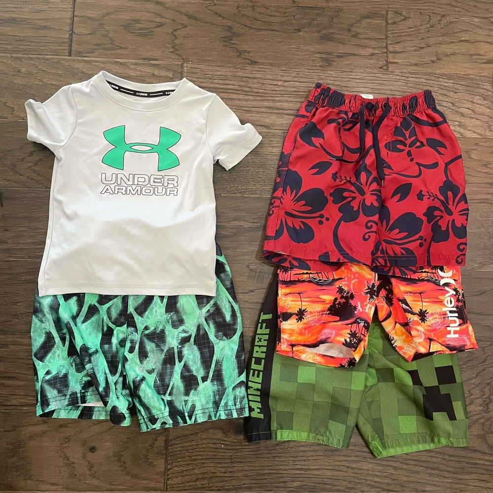 4 Boys swimsuits. Size 5 , Small. Great Condition